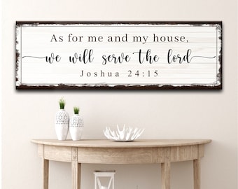 May include: White wooden sign with black text that reads "As for me and my house, we will serve the Lord Joshua 24:15". The sign has a distressed, rustic look.