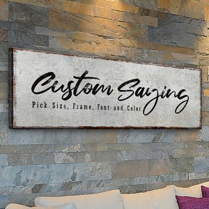 May include: White wooden sign with black text that reads "Custom Saying Pick Size, Frame, Font and Color".