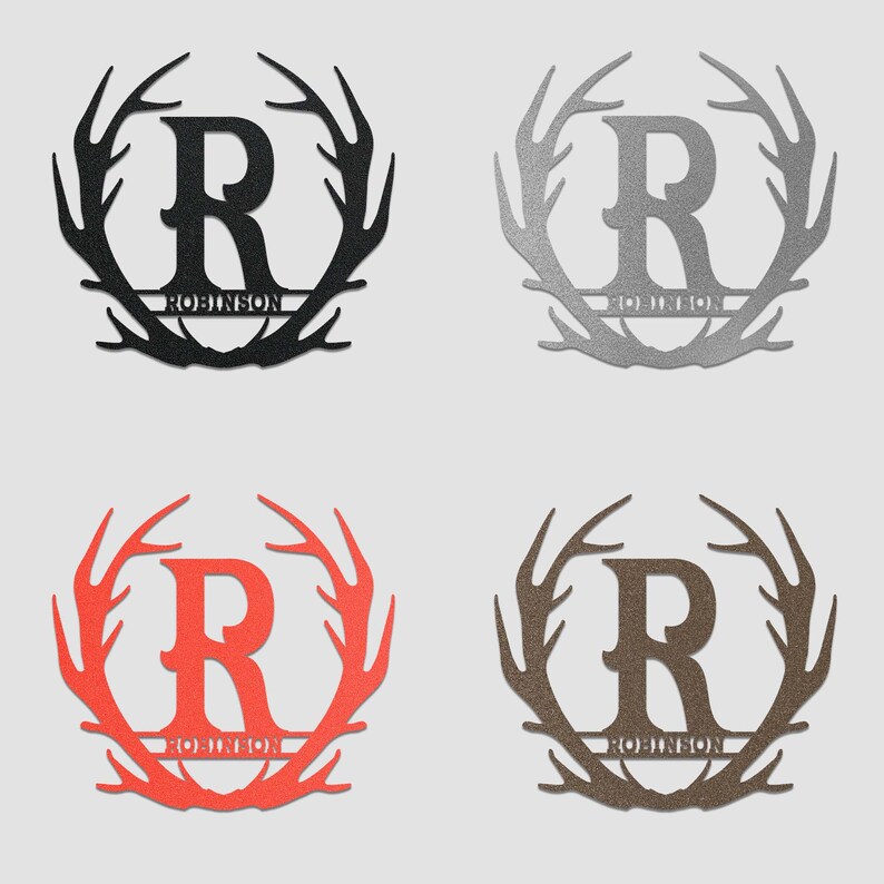 May include: Four metal wall decorations featuring a large letter "R" surrounded by a wreath of antlers. The name "Robinson" is written below the letter. The wreaths are in black, silver, red, and brown.