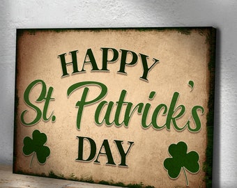 May include: A vintage-style sign with a distressed background featuring the text "Happy St. Patrick's Day" in green and black lettering. Two green shamrocks are on either side of the text.
