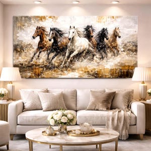 May include: A large rectangular wall art print featuring a dynamic scene of six horses galloping across a textured, abstract landscape. The horses are depicted in various shades of brown, black, and white, creating a sense of motion and energy.