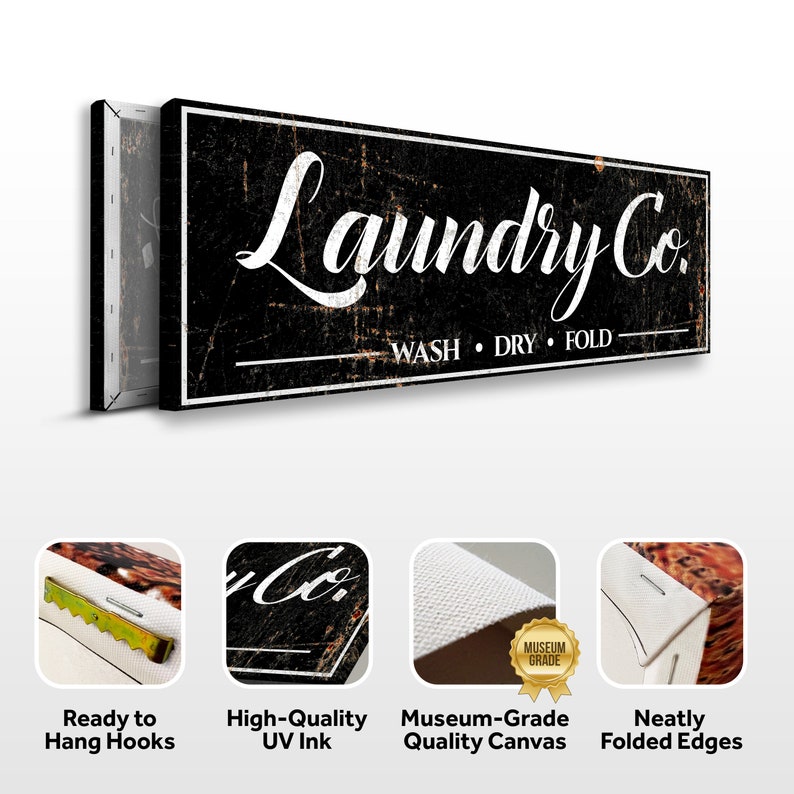Puede incluir: Lienzo de pared en blanco y negro con el texto "Laundry Co. WASH DRY FOLD" en estilo vintage. El lienzo est&aacute; estirado sobre un marco de madera y tiene un aspecto desgastado. La imagen tambi&eacute;n muestra detalles del lienzo, incluidos los ganchos para colgar, la tinta UV de alta calidad y el lienzo de calidad de museo.