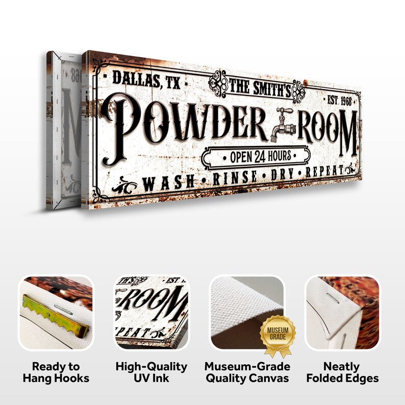 May include: A white canvas print with a vintage-style sign that reads "Dallas, TX. The Smith's Est. 1968. Powder Room. Open 24 Hours. Wash. Rinse. Dry. Repeat." The sign has a rusty metal texture and is framed with a black border. The print is ready to hang with sawtooth hangers on the back.