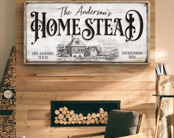 May include: A white wooden sign with black text that reads "The Anderson's Homestead Established 2024". The sign also includes a drawing of a house and the text "San Antonio, Texas".