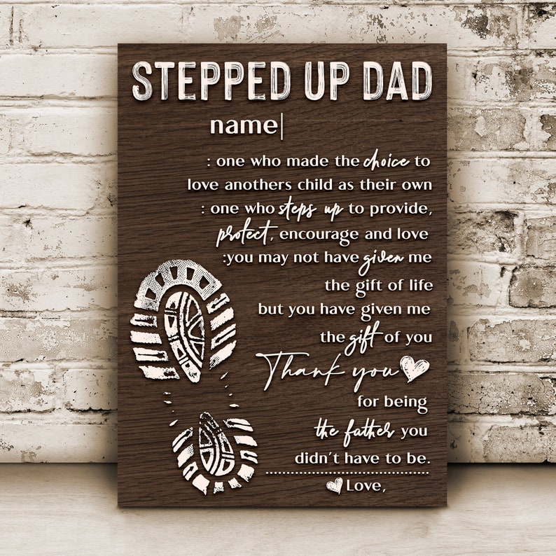 May include: A brown wooden sign with white text that reads "Stepped Up Dad" and a personalized name. The sign also includes a quote about the love and support of a stepdad. The quote includes the words "protect, encourage, and love".