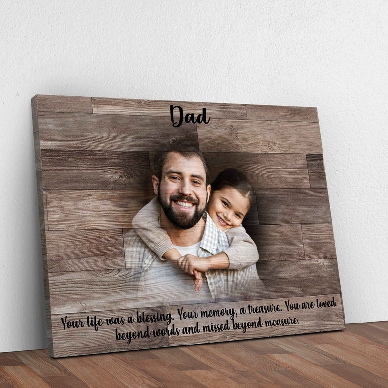 In Loving Memory Sympathy Remembrance of Dad in Heaven Memorial Wall Decor Sign with classic black text script and personalized photo of dad and daughter embellishment on a natural grain wood-inspired canvas panel.