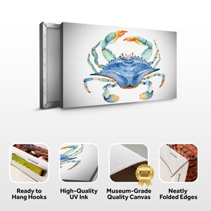 May include: A watercolor painting of a blue crab with orange claws on a white canvas. The canvas is stretched and ready to hang with hanging hooks on the back. The canvas is museum-grade and has neatly folded edges.