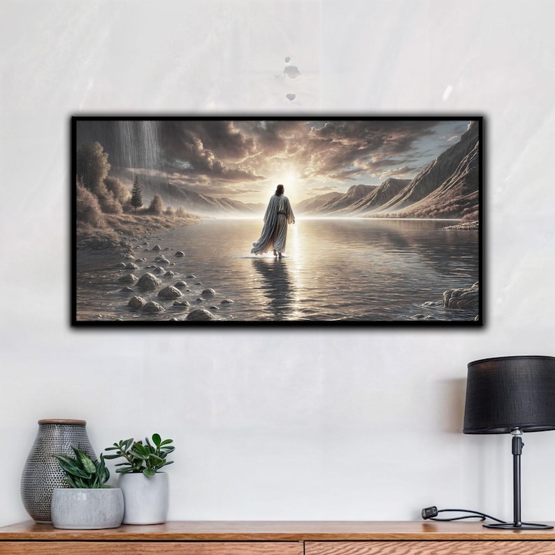 May include: A painting of a man walking on water towards a bright light in the distance. The water is calm and the sky is cloudy. The man is wearing a white robe and has his back to the viewer.