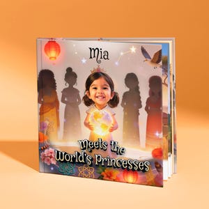 Könnte beinhalten: Kinderbuch mit dem Titel "Mia Meets the World's Princesses". Das Cover zeigt ein lächelndes Mädchen mit Krone, das einen leuchtenden Globus hält. Silhouetten von Prinzessinnen und eine Möwe sind im Hintergrund. Heller orangefarbener Hintergrund.