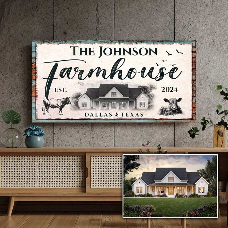 May include: A rectangular farmhouse sign with the text "The Johnson Farmhouse" in black script. The sign includes a drawing of a farmhouse, two cows, and the text "Dallas Texas". The sign has a distressed look with a blue border.
