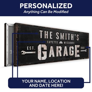 May include: Black and white sign with the text "The Smith's Garage" with the words "Est." and "2021" on either side of the word "Garage". The sign also includes the text "Fayette, Missouri".