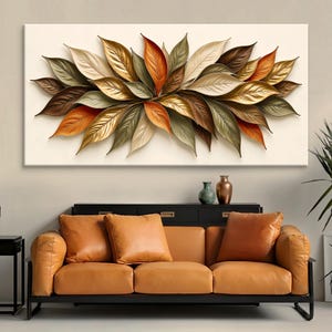 May include: A rectangular wall art piece featuring a layered arrangement of metallic leaves in shades of gold, bronze, copper, and muted green. The leaves are clustered horizontally against a plain, light-colored background.