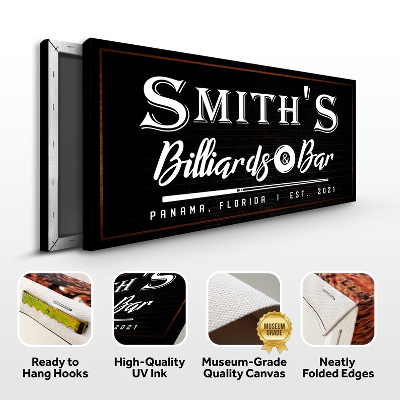 May include: A black and white canvas print with the text "SMITH'S Billiards & Bar" in white lettering. The text "PANAMA, FLORIDA I EST. 2021" is also included in white lettering. The canvas print has a brown wooden frame.