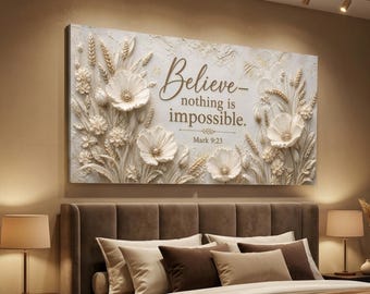 Puede incluir: Una pieza de arte mural rectangular con un diseño de relieve floral texturizado en color blanco roto con espigas de trigo y flores. El centro muestra el texto en marrón: Believe—nothing is impossible. Mark 9:23. La obra tiene una paleta neutra.