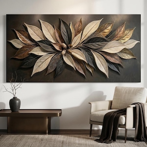 May include: A rectangular wall art piece featuring a horizontal arrangement of layered, three-dimensional leaves in shades of cream, bronze, copper, and dark brown. The central cluster includes small, rounded seed-like elements amidst the foliage.