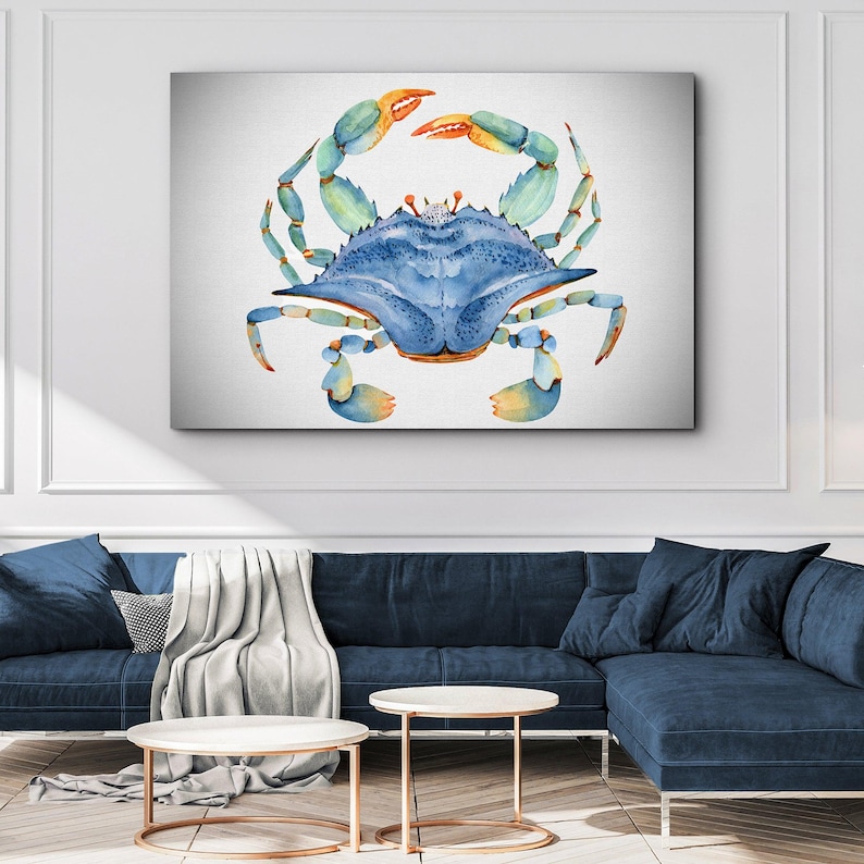May include: A watercolor painting of a blue crab with orange claws on a white background.