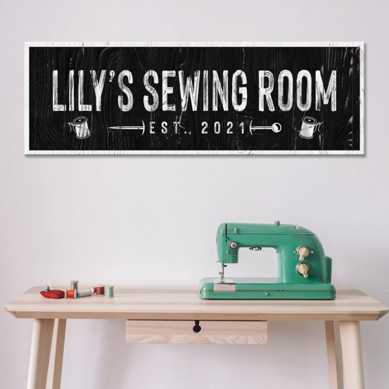 Sewing Room Name Sign with personalized chalk white scripts on a rustic charcoal black canvas.