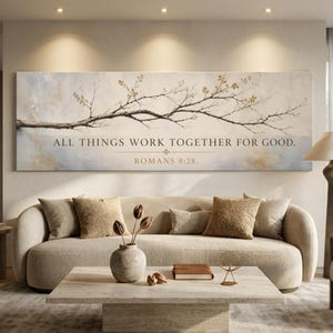 May include: A rectangular wall art print featuring a horizontal tree branch with small golden leaves against a soft cream and blue background. The text reads ALL THINGS WORK TOGETHER FOR GOOD. ROMANS 8:28 in a dark serif font centered below the branch.