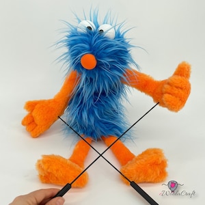 Blue Caveman with orange accent - hand puppet, muppet style
