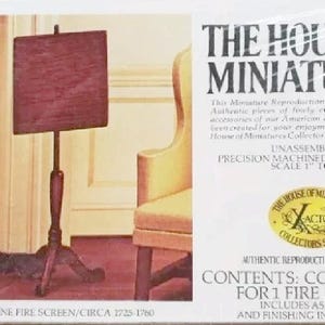 May include: A miniature Queen Anne fire screen kit. The screen has a dark wood finish and a rectangular shape. The kit includes unassembled precision machined wood parts. The packaging features the text "THE HOUSE OF MINIATURES".