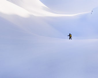 Woman backcountry skiing on the way to Sky Pilot up the Gondola in Squamish, BC [photography wall print]