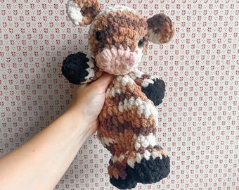 Coccole a forma di mucca fatte a mano all'uncinetto, morbidissime e perfette come coperte di lana.