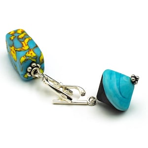 Long & Short Blue Murano Earrings • Asymmetrical satin Murano glass earrings. Blue-black bicone, blue-yellow brick. Secure silver closures