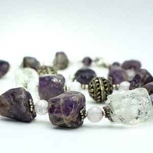 Rock Crystal & Amethyst Necklace •  Dark rough amethyst, transparent rock crystal and openwork silver beads. Alluring radiant necklace
