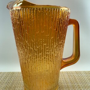 Vintage Jeanette Iridescent Marigold Tree Bark Patterned Glass Pitcher.