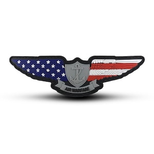 May include: A gray and black embroidered patch with an American flag design, an anchor, and the text "AIR WARFARE".
