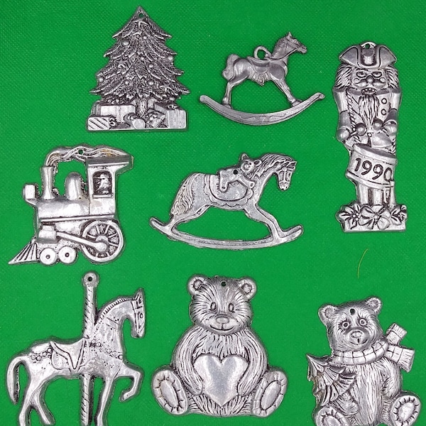 Pewter Ornaments. Bear/Christmas Tree, Bear/Heart, Carousel Horse, Rocking Horses, Wooden Soldier, Train Engine, Christmas Tree. Engraveable