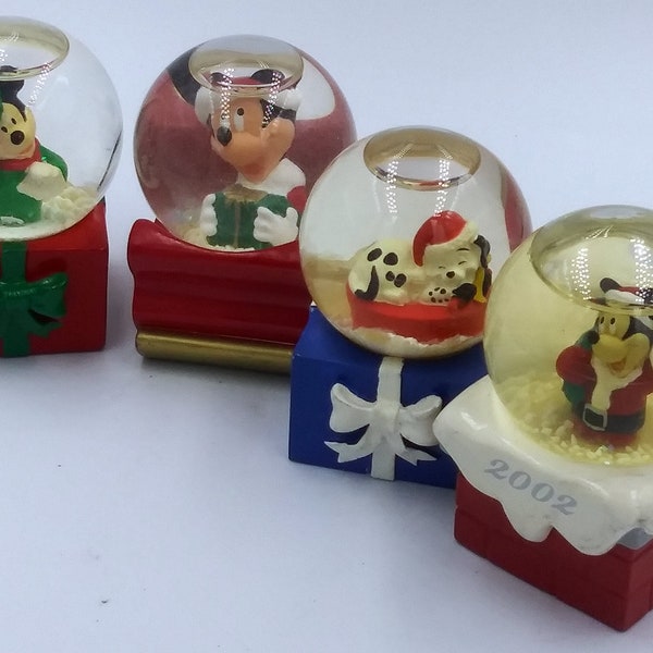 JC Pennny Disney Snow Globes.   Mickey on red present,sleigh and chimney base.   Vintage. Collectable
