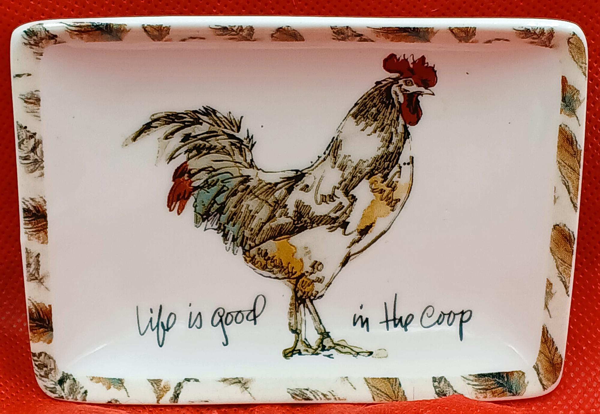 Creative Co-op "Life is good in the Coop" dish/condiment plate.  White/Brown Rooster.  Feathers. Signed by artist.