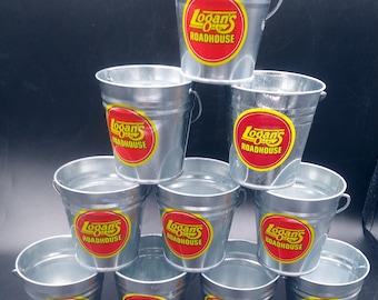 Lot of 5 Logans Roadhouse Restaurant Mini Tin Peanut Buckets. Handle.  Silver with Logan's Orange/Yellow Logo. Bar/Counter Display or Use.