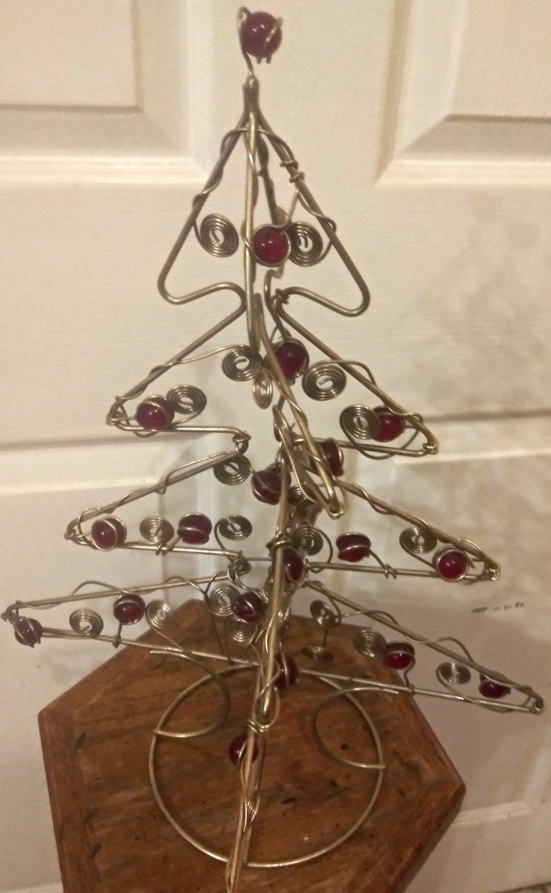 Tall Heavy Metal/wire Christmas Tree. Red Marbles/beads. Gold Swirl Discs. Round Metal Bottom