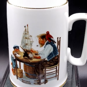 Mug Norman Rockwell Museum : céramique blanche avec bordures dorées