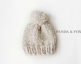 Hand knit Wheat Beanie with yarn pom pom. Newborn, gender neutral for boy or girl