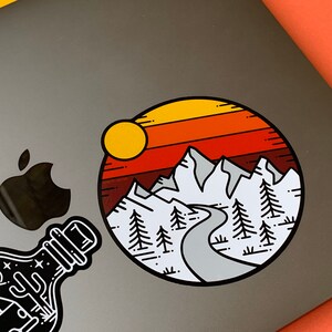 The mountains are calling Vinyl sticker, great for sticking on your kit!!