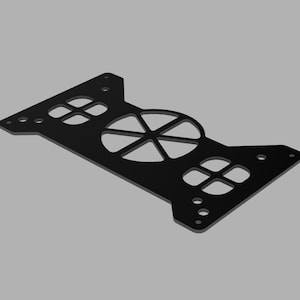 May include: Black metal bracket with a geometric design. The bracket has a rectangular shape with cut-out circles and cross-shaped openings. It features a central circular opening with radial lines and mounting holes.