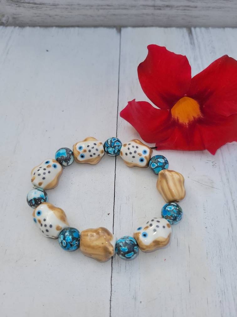 Blue and brown owl beaded stretch bracelet