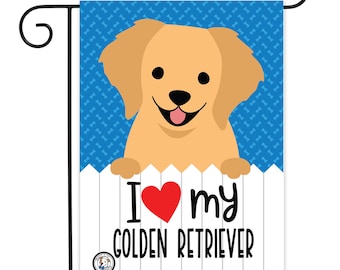 May include: A garden flag with a white picket fence and a cartoon golden retriever puppy peeking over the top. The flag has a blue background with a bone pattern and the text "I love my golden retriever" in black with a red heart.