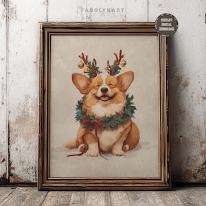 May include: A framed print of a smiling corgi, decorated with a Christmas wreath and reindeer antlers with gold baubles. The artwork has a vintage style, with the text "INSTANT DIGITAL DOWNLOAD" on a circular sticker.