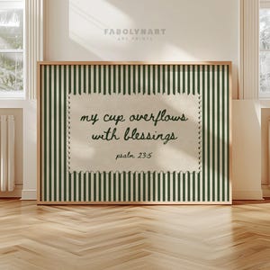 Framed print with green stripes and text "my cup overflows with blessings psalm 23:5".