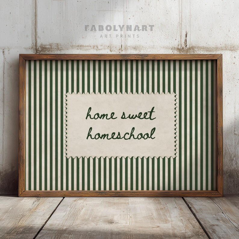 Framed print with green and white stripes, featuring "home sweet homeschool" text.