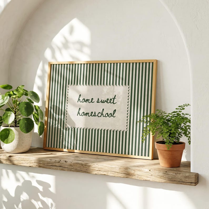Framed print with green and white stripes and text "home sweet homeschool".