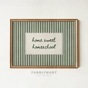 Framed art print with green and white stripes and text "home sweet homeschool."