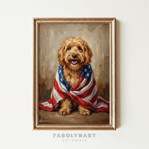 May include: A framed print of a golden-colored dog wrapped in an American flag. The dog is smiling with its tongue out. The artwork is signed "FABOLYNART ART PRINTS" at the bottom.