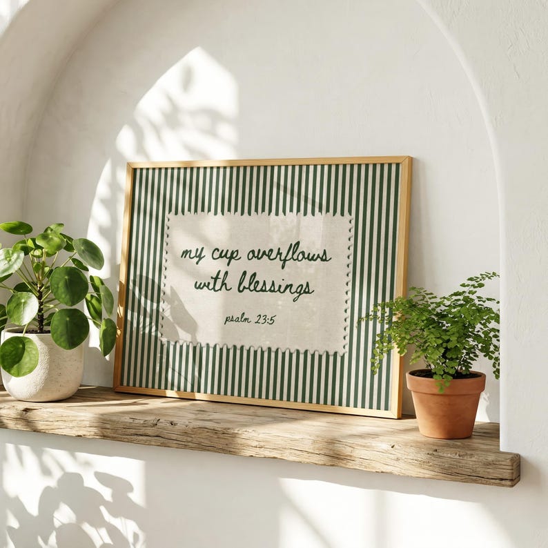 Framed print with green stripes and text "my cup overflows with blessings psalm 23:5".
