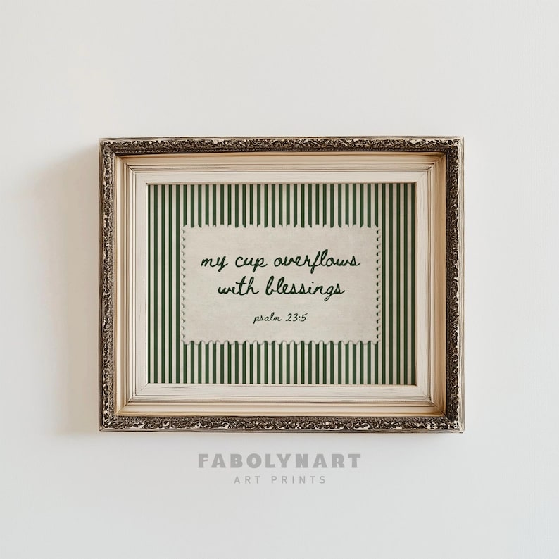 Framed artwork with scripture "my cup overflows with blessings psalm 23:5".