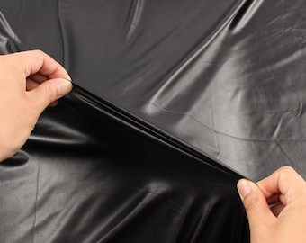 Material de tela de PU de cuero sintético negro elástico de 4 vías para ropa pantalones cortos respaldo de spandex de punto 140 cm-1 yarda